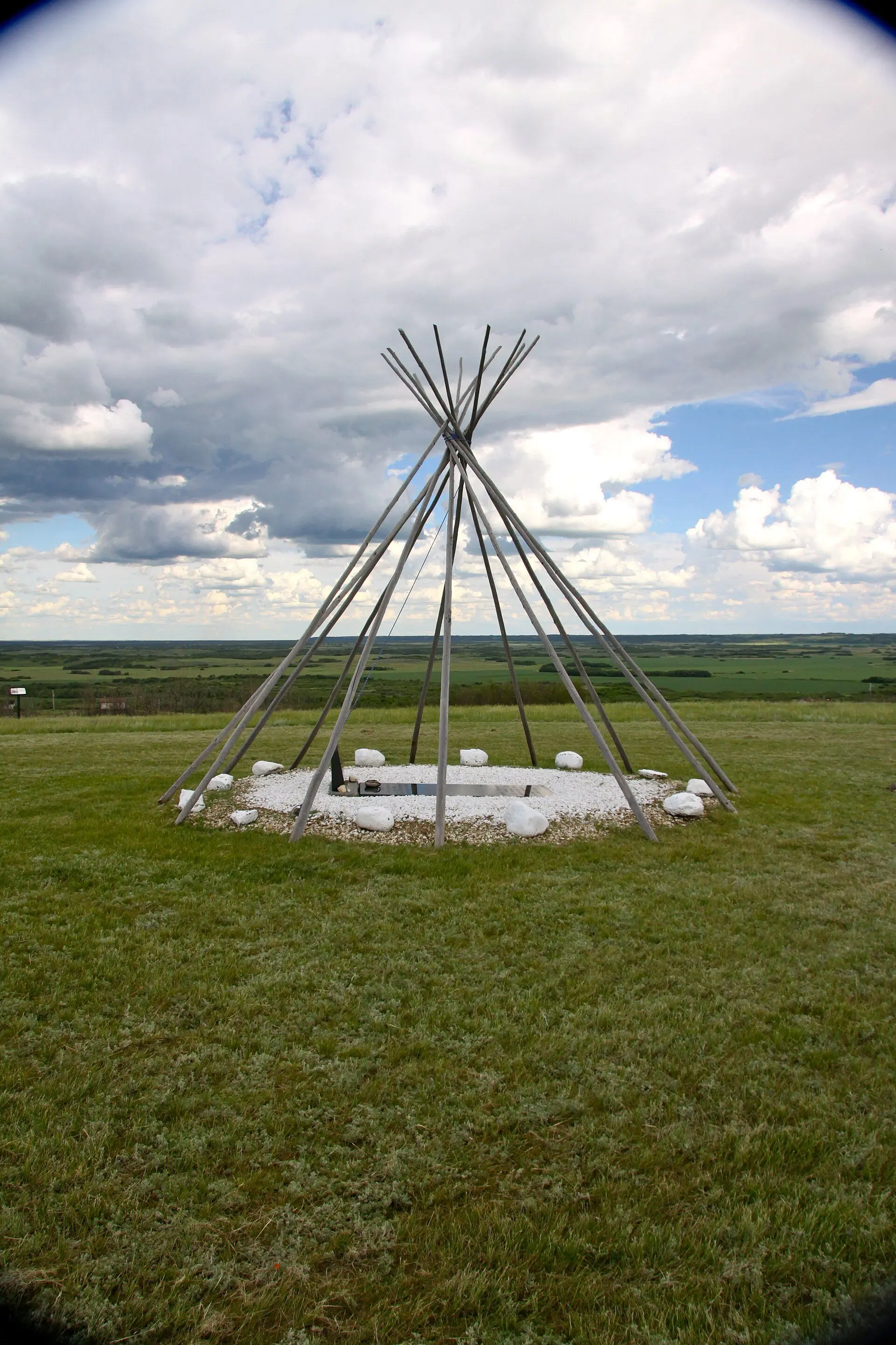 Tipee pole frame at Chief Poundmaker's grave on the hilltop
