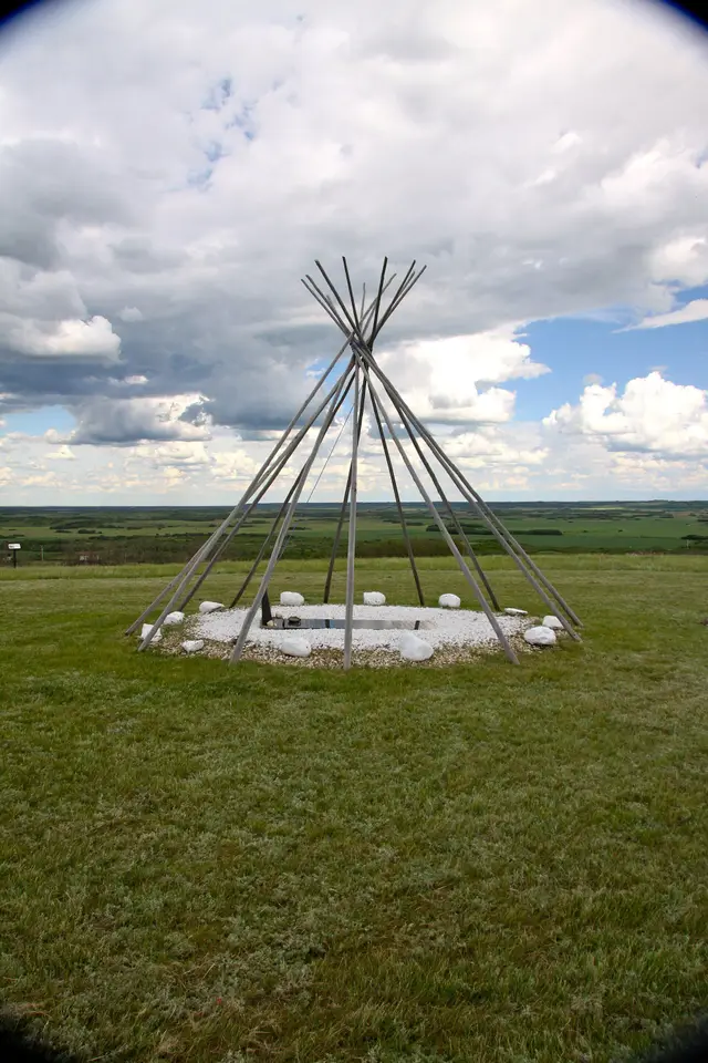 Tipee pole frame at Chief Poundmaker's grave on the hilltop